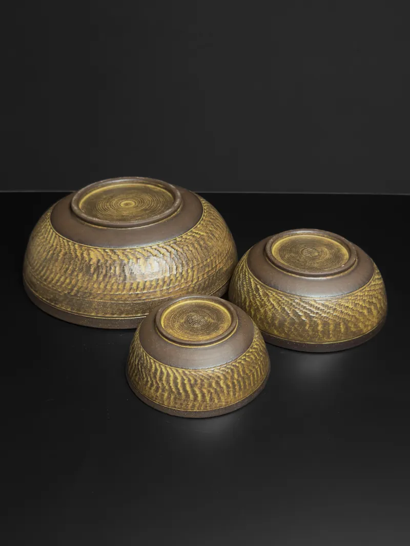 Three bowls with carved chatter texture