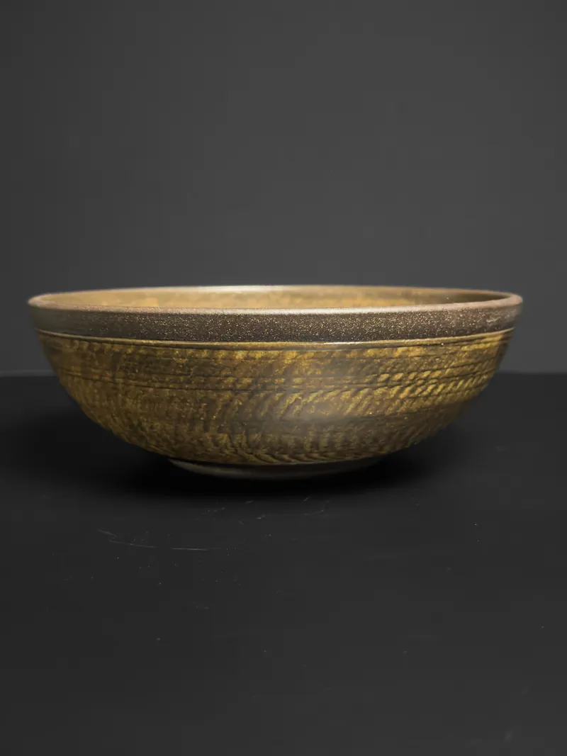Wide bowl with carved chatter texture
