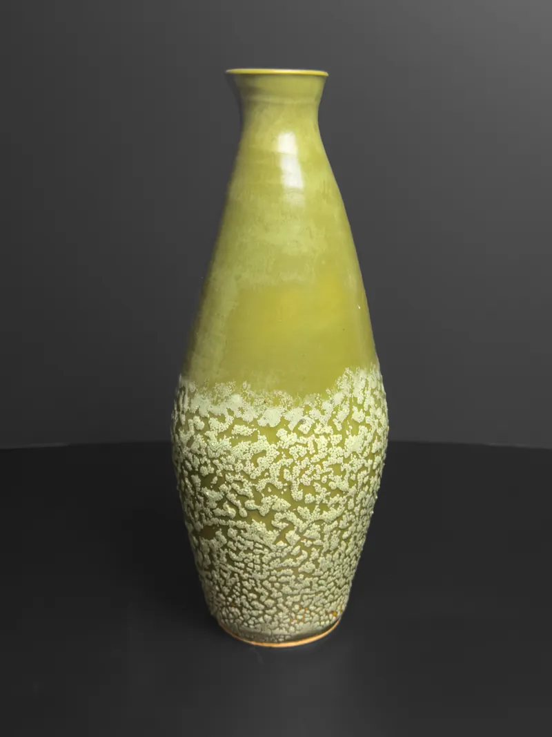 Chartreuse bottle vase with a crawled glaze on the lower half